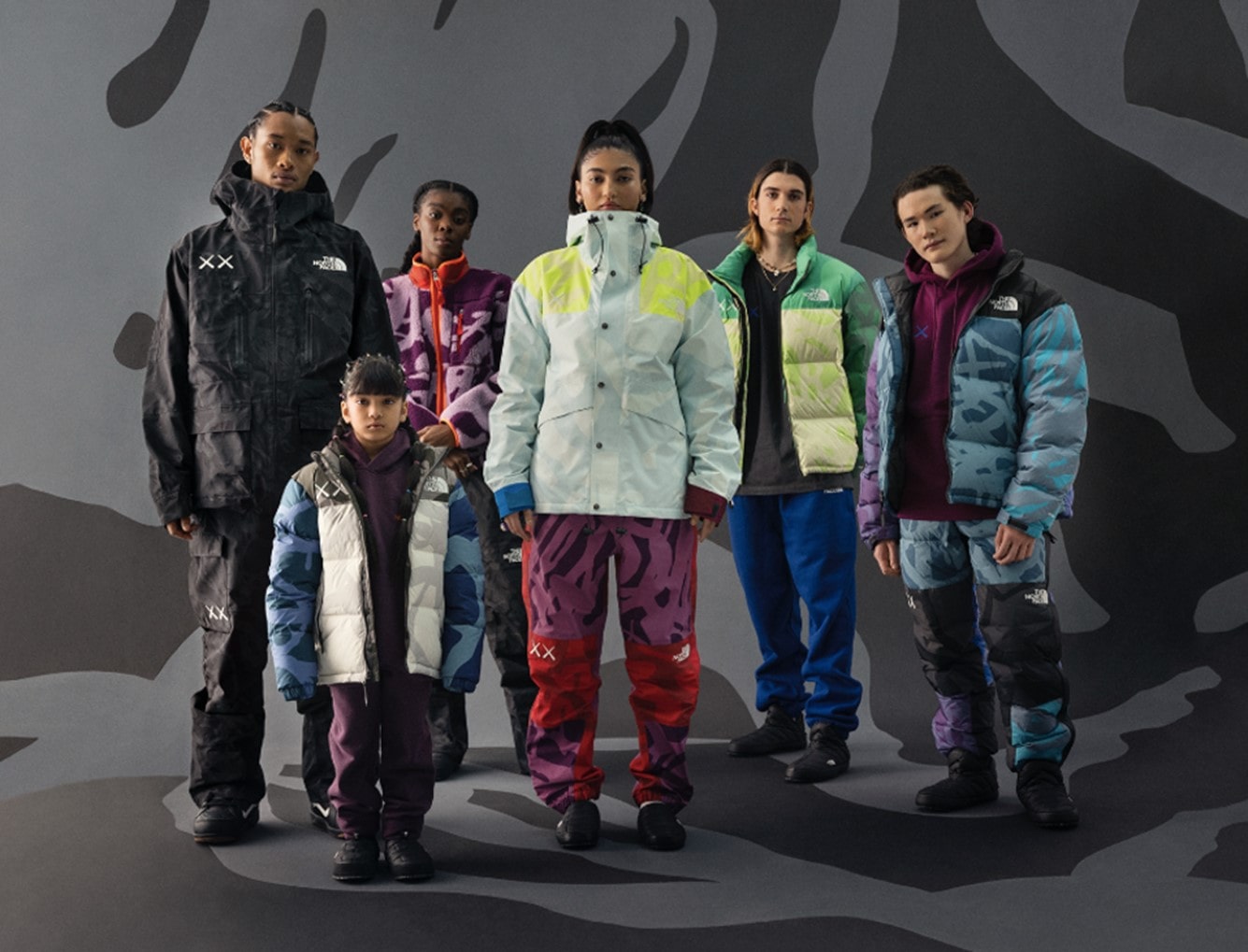 People in The North Face collaborative apparel with KAWS