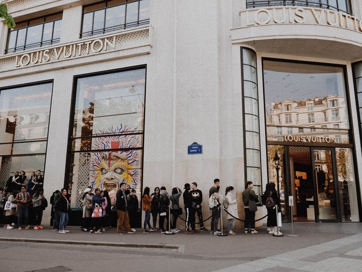 customers queuing outside store