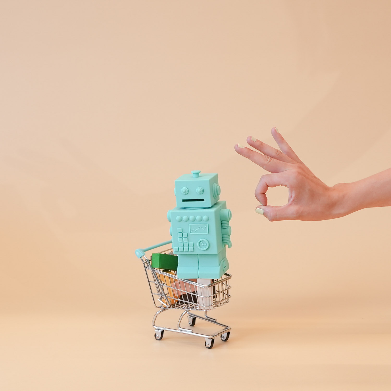 Green ticket bot with blue ticket in its mouth